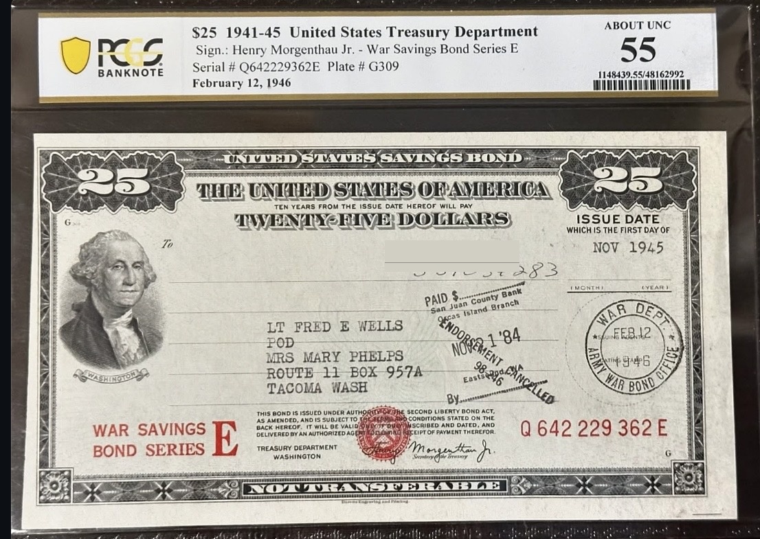Front of the 1945 Series E War Savings Bond, with a private handwritten number redacted